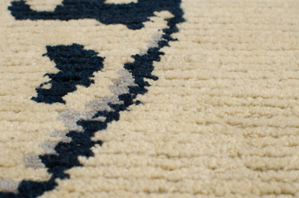 Showa - inspired by tropical flowers - handmade affordable high quality rug designed in Toronto and handwoven in Nepal