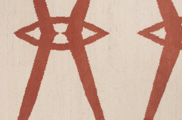 Close up of Chaise, a rug with a geometric design by Amala Carpets - handmade with hand-carded Himalayan sheep wool. Featured in Interior Design Magazine's Fall Market Tabloid 2015