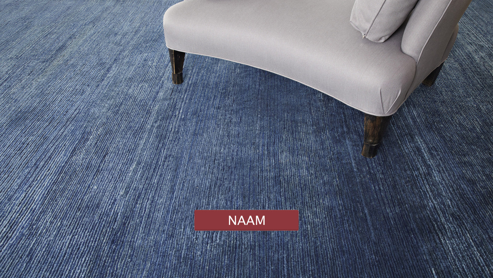 Naam is a museum quality rug handmade with handcarded himalayan wool and indigo vegetable dyes